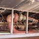 Image for article titled An Old, Neglected Coach Bus Was Turned Into A Classy Car Hauler